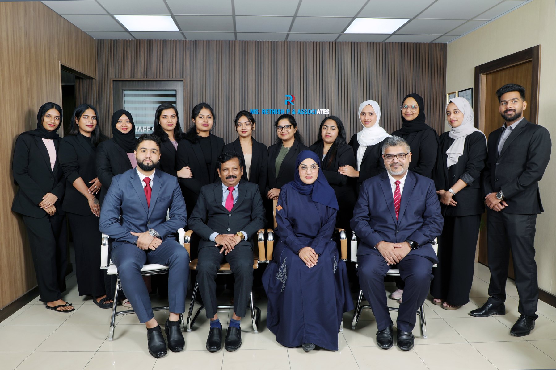 The whole team together in the office